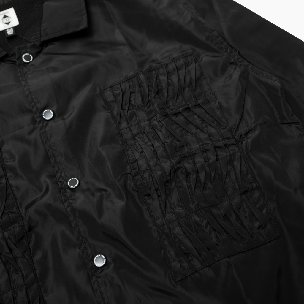 EXPANSION NY EP HACKING JACKETブラックのフロントポケット。イギリスの乗馬服ハッキングジャケットを思わせるデザイン。
