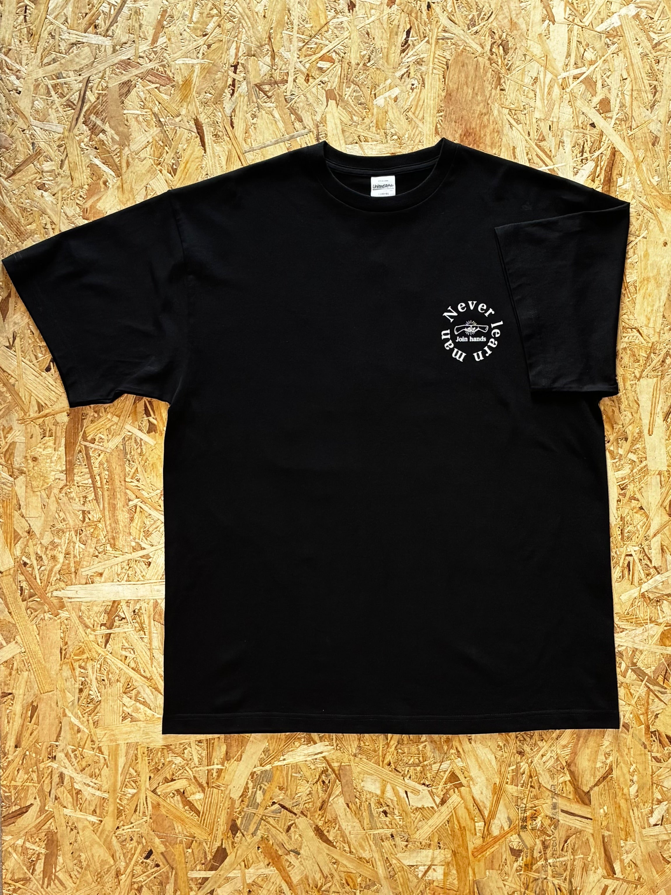 Never Learn Man Tシャツ フロント サークルロゴプリント　ブラック