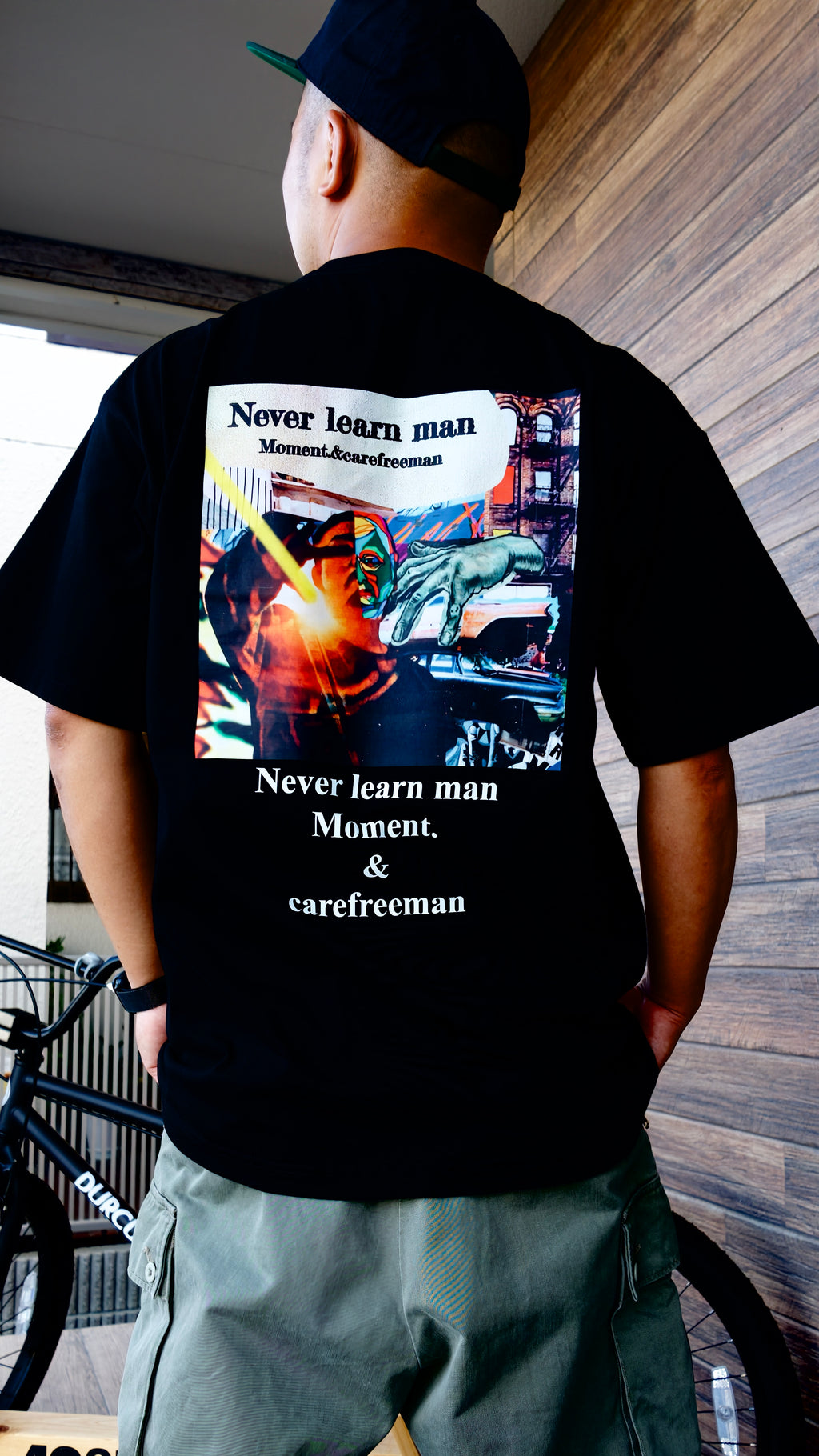 Never Learn Man 記念Tシャツ ヒップホップ ストリートスタイル　バック