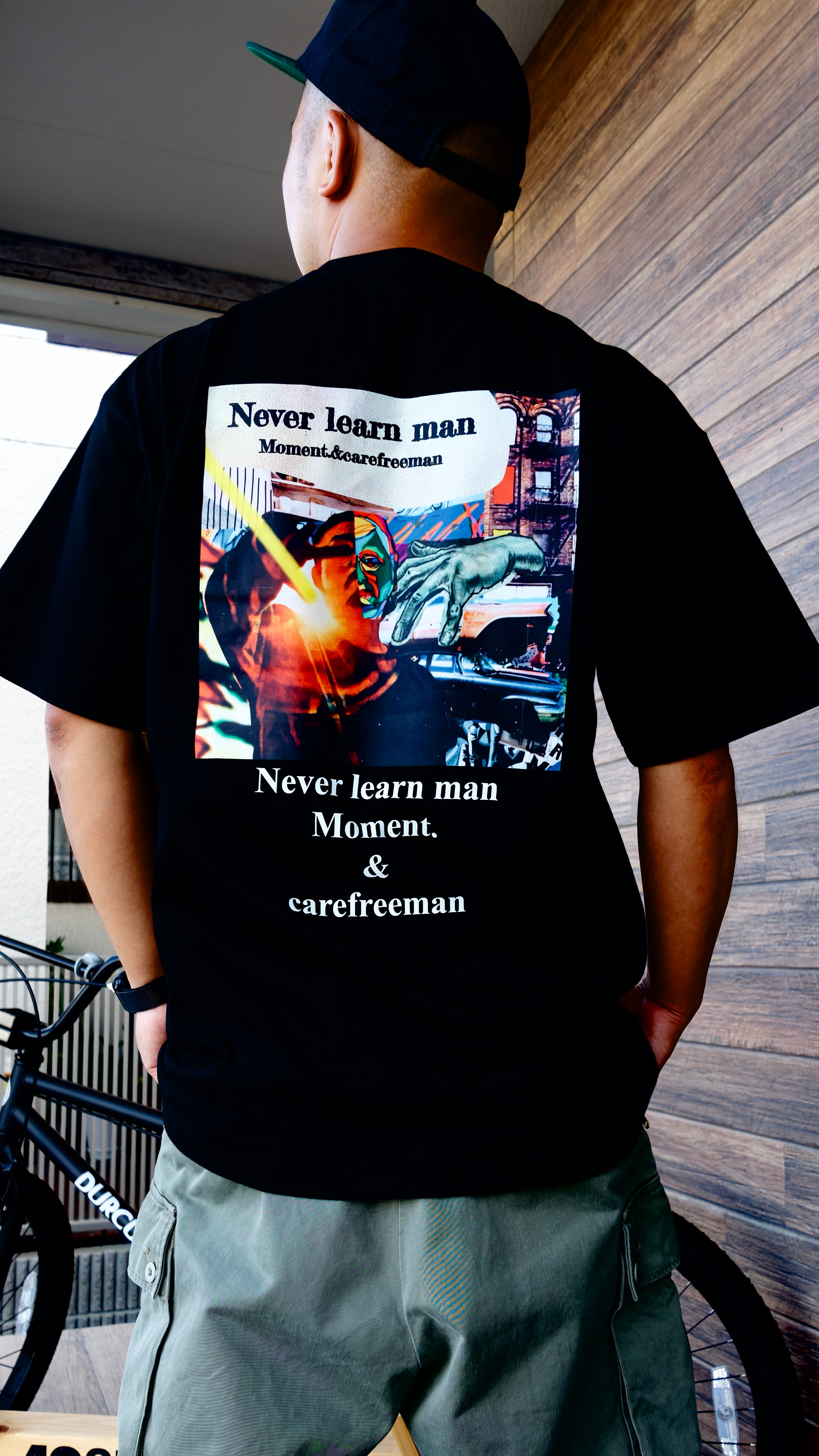 Never Learn Man 記念Tシャツ ヒップホップ ストリートスタイル　バック