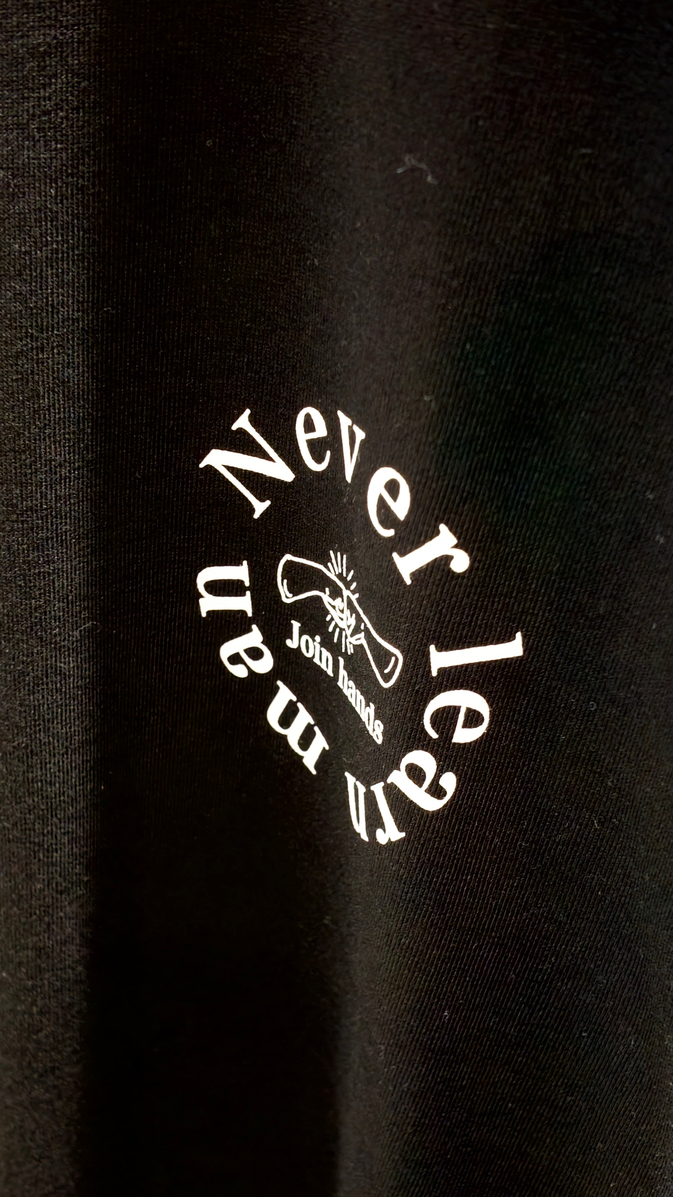 Never Learn Man Tシャツ フロント サークルロゴプリント　ブラック　